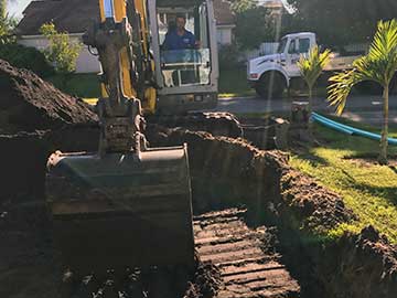 Septic site excavating for septic system installation.